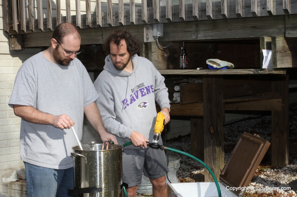 He also helped by taking this picture of Mathew and me cooling the wort with the wort chiller.