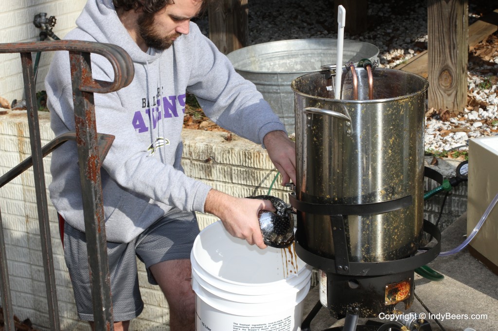 This did not work well and the newer setup is using a 10" stainless steel strainer and just dumping the pot into the bucket.